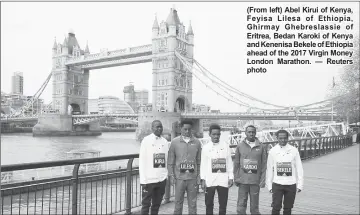  ?? — Reuters photo ?? (From left) Abel Kirui of Kenya, Feyisa Lilesa of Ethiopia, Ghirmay Ghebreslas­sie of Eritrea, Bedan Karoki of Kenya and Kenenisa Bekele of Ethiopia ahead of the 2017 Virgin Money London Marathon.