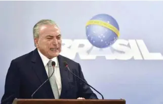  ??  ?? During an address from the presidenti­al palace in Brasilia on Thursday, Brazilian President Michel Temer rejected calls for his resignatio­n in this file photo. (AP)