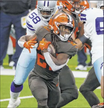  ?? Michael Ainsworth The Associated Press ?? The Raiders have been generous on defense, which could lead to major gains for Cleveland’s running game, featuring Kareem Hunt.