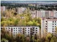  ?? Foto: dpa ?? Ein Reiseziel? Verlassene Hochhäuser von Prypjat nahe Tschernoby­l.