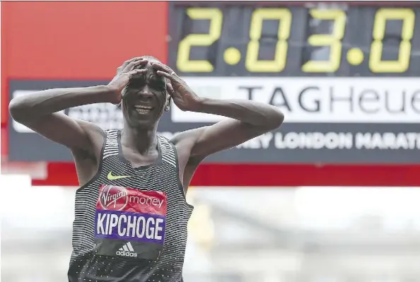 ?? JUSTIN TALLIS/GETTY IMAGES/FILES ?? Kenya’s Eliud Kipchoge finished the 2016 London Marathon in a time of 2:03.05, seconds shy of the world record of 2:02:57 set by fellow Kenyan Dennis Kimetto at the Berlin Marathon. Runners around the world are trying to break the two-hour marathon mark.