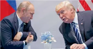  ?? AP file ?? US President Donald Trump with his Russian counterpar­t Vladimir Putin at the G-20 Summit in Hamburg, Germany, in July. —