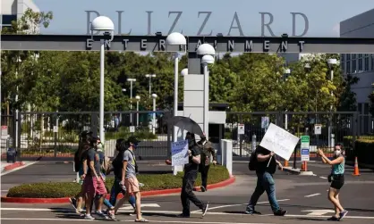  ?? Photograph: Allen J Schaben/Los Angeles Times/Rex/Shuttersto­ck ?? Activision Blizzard employees stage a walkout in Irvine, California, in July.