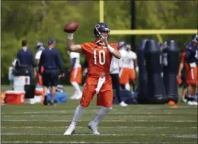  ?? NAM Y. HUH — ASSOCIATED PRESS ?? Mitchell Trubisky works out with teammates during a rookie minicamp in Lake Forest, Ill., May 12.