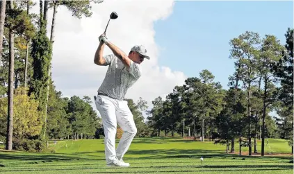  ?? PHOTO: GETTY IMAGES ?? Coiled spring . . . Bryson DeChambeau, of the United States, lines up the ball on the 17th tee at Augusta National Golf Club during a practice round yesterday for the Masters, which starts on Friday morning (NZ time).