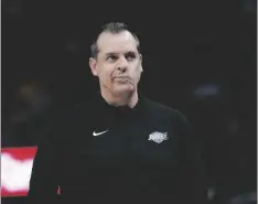  ?? AP PHOTO/JEFF CHIU ?? Los Angeles Lakers coach Frank Vogel walks along the sideline during the second half of the team’s NBA basketball game against the Golden State Warriors in San Francisco, on Thursday.