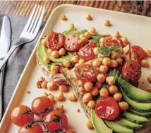  ??  ?? Spinach, feta and red pepper muffins, main; chickpea and avocado bruschetta, above