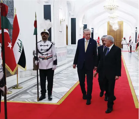  ?? AFP ?? Iraq’s President Abdul Latif Rashid, right, with Turkey’s President Recep Tayyip Erdogan at the Presidenti­al Palace in Baghdad