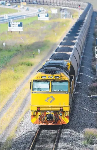  ?? Picture: AAP ?? An Aurizon train hauling coal through the Hunter Valley in NSW.