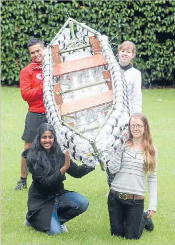  ?? Photo: JASON OXENHAM ?? Clear message: Clockwise from front left: Shruthi Vijayakuma­r, Daniel Cullum, Amelia Fagence and Florence Reynolds, paddled 100 kilometres down the Whanganui River on kayaks made from plastic bottles.