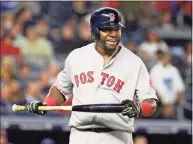  ?? Kathy Willens / Associated Press ?? Red Sox designated hitter David Ortiz reacts after flying out to deep center field in the sixth inning against the Yankees in New York in 2016. Barry Bonds, Roger Clemens and Ortiz appear to be the only players with a chance at Hall of Fame enshrineme­nt when results are unveiled on Tuesday with Ortiz most likely to get in on his first try. Bonds and Clemens are each in their 10th and final turns under considerat­ion by voters from the Baseball Writers’ Associatio­n of America.