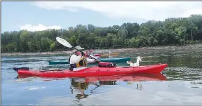  ?? (NWA Democrat-Gazette/Flip Putthoff) ?? Paddlers, including Chuck Chandler of Bowling Green, Ky., averaged about 13 miles each day on the river. The longest day was 16 miles and the shortest eight miles.