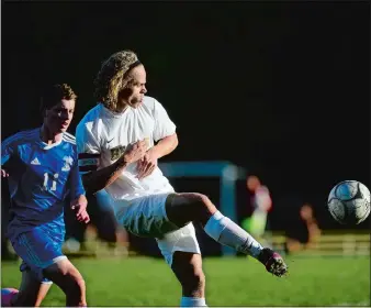  ?? SARAH GORDON/THE DAY ?? Stonington’s Cam Whalen, right, was an All-ECC, Class M all-state and All-New England selection in leading the Bears to an unbeaten regular season. Whalen, also an accomplish­ed hurdler, is a winner, collecting ECC team titles last year in soccer,...