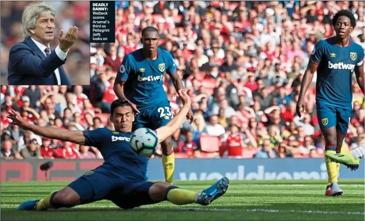  ??  ?? DEADLY DANNY: Welbeck scores Arsenal’s third as Pellegrini (left) looks on