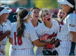  ?? TERRY PIERSON – STAFF PHOTOGRAPH­ER ?? HIGH SCHOOL SOFTBALL
Valley View’s Annamaria Nuno is mobbed by teammates after hitting a walk-off single in the eighth inning for a 2-1 CIF-SS Division 1 wild-card victory over Cypress on Tuesday.