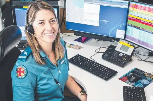  ?? ?? PRESSURE COOKER: QAS emergency medical dispatcher Carly Meyer loves the fast pace of her rewarding job.
Picture: Kevin Farmer