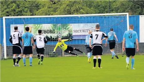  ?? Paul Watson ?? Craig Cairns (No.10) tucks away Runcorn Town’s first goal against Barnton from the penalty spot in the club’s 4-1 victory on Easter Sunday evening. It was the team’s 100th league goal of the season.