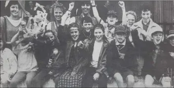  ??  ?? A group of happy Rathnew supporters at the drawn game in the Carlisle Grounds.