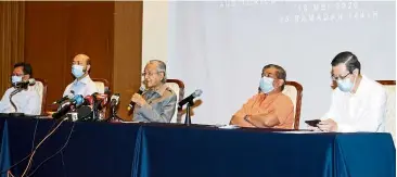  ??  ?? Saying his piece: dr Mahathir speaking at the press conference at Perdana Leadership Foundation in Putrajaya. With him are (from left) shafie, Mukhriz, Mohamad and Lim.