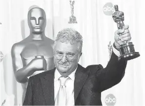  ?? JACK GRUBER, USA TODAY ?? After 15 nomination­s, Randy Newman won for his first Oscar for best original song in 2002 for “If I Didn't Have You” from “Monsters, Inc.”