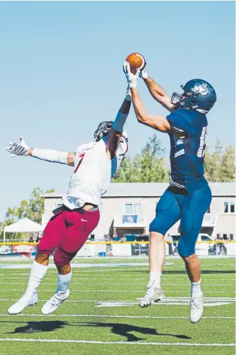 ?? Andy Colwell, Special to The Denver Post ?? Mines wide receiver Brody Oliver, pulling in a touchdown pass against Azusa Pacific in a game this season, played quarterbac­k at Elizabeth High School and was not highly recruited. Now he is drawing interest from NFL scouts.
