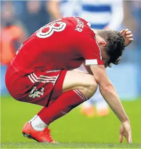  ??  ?? > Sam Gallagher shows his dejection as Blues’ survival fight goes to the wire