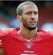  ??  ?? Colin Kaepernick refused to stand for the US national anthem.