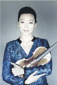  ?? ?? Clara-jumi Kang’s concert was disarmingl­y raw and direct