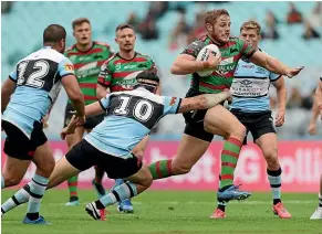  ?? GETTY IMAGES ?? South Sydney’s Tom Burgess on the burst against Cronulla last night.