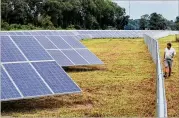  ?? BOB ANDRES/BANDRES@AJC.COM ?? Georgia Power officials have warned of supply chain issues and a federal investigat­ion of panel makers could delay deployment of solar arrays.
