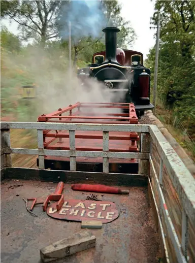  ?? ?? A rider’s view of double Fairlie No. 10 Merddin Emrys at the head of the uphill working on October 7. In the wagon are the last vehicle marker board and red flag that will be put up for the downhill working.
