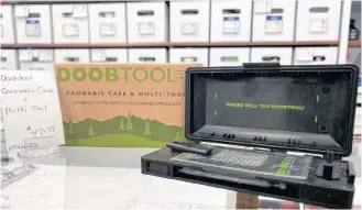  ??  ?? “It’s like a Swiss Army knife for cannabis,” said sales clerk Bonnie Critcher, referring to the Doobtool. The case has 10 tools regular users of cannabis need.