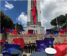  ??  ?? Performing arts students from the New Zealand School of Dance and the Te Auaha New Zealand Institute of Creativity perform the dance, A Roaring Chorus, at Pukeahu National War Memorial Park in Wellington on Sunday