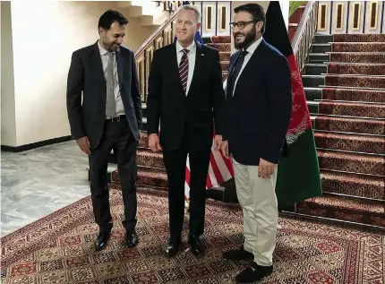  ??  ?? Acting Pentagon chief Patrick Shanahan, center, with Afghanista­n's acting Defense Minister Asadullah Khalid, left, and Afghan National Security Adviser Hamdullah Mohib in Kabul on Monday. AFP