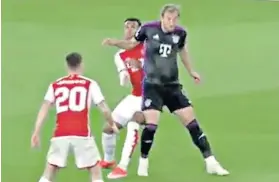  ?? ?? Violent act: Harry Kane plants his elbow into the face of Gabriel Magalhaes