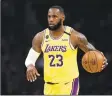  ?? Marcio Jose Sanchez / Associated Press ?? LeBron James says he won’t wear one of the NBA-approved social justice messages on the back of his jersey when the NBA resumes competitio­n.