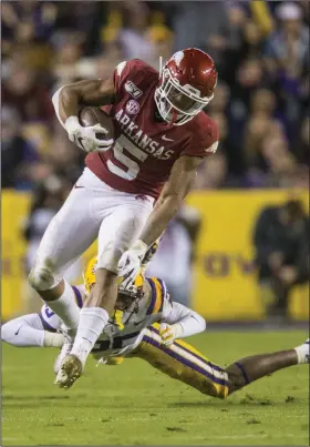  ?? (NWA Democrat-Gazette/Ben Goff) ?? Arkansas running back Rakeem Boyd said new Coach Sam Pittman’s experience with Georgia, which won the SEC East Division title the past three years, was a big reason for his decision to return for his senior season.