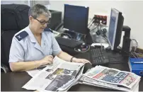  ?? (Nir Elias/Reuters) ?? BRIG.-GEN. SIMA VAKNIN-GIL, the chief military censor, works at her office in Tel Aviv on Thursday.