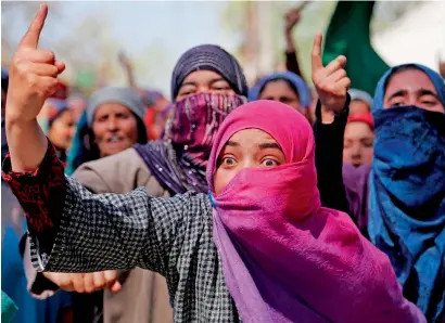  ?? AP ?? A woman shouts slogans during the funeral of Umer Farooq, a civilian, who was killed on Sunday at Baroosa village, near Srinagar. —