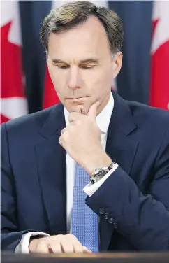  ?? SEAN KILPATRICK / THE CANADIAN PRESS FILES ?? With a balanced federal budget decades away thanks to Liberal government deficits, it’s no wonder Finance Minister Bill Morneau has been shy on specifics.