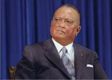  ?? HARVEY GEORGES — THE ASSOCIATED PRESS ?? FBI Director J. Edgar Hoover, is shown at the 1971gradua­tion ceremonies for the Federal Bureau of Investigat­ion in Washington. Government informants are an age-old investigat­ive tactic that’s as much a part of the FBI’s 110years of history as J. Edgar...