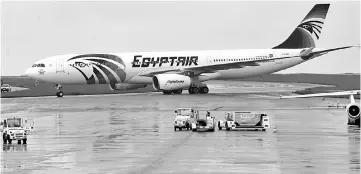  ??  ?? This file photo taken on May 19 shows an Egyptair Airbus A330 from Cairo being taxied at the Roissy-Charles De Gaulle airport near Paris after it landed a few hours after the MS804 Egyptair flight crashed into the Mediterran­ean. — AFP photo