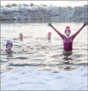  ?? ?? Wild swimmers from West Lothian Dippers brave the chilly waters with a dip at Winchburgh