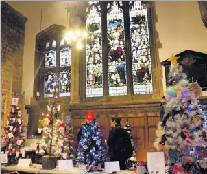  ??  ?? ■ Last year’s annual Loughborou­gh Community Christmas Tree Festival. Photo courtesy of Factor Design.