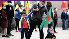  ??  ?? Dylan Serxwebun, left, 6, and his brother Robuo, 4, alongside members of Kurdish Community Scotland during a demonstrat­ion in Edinburgh protesting against Turkish air raids in Iraq