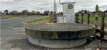  ??  ?? Top: Overlookin­g Hastings and Havelock North, where contaminat­ed water was linked to four deaths. Above: One of Havelock North’s town water supply bores.