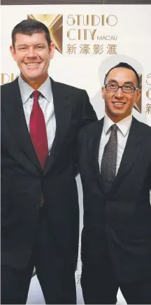  ?? Picture: JONATHAN NG ?? James Packer with Melco’s Lawrence Ho, who is buying almost half of his stake in Crown Resorts.