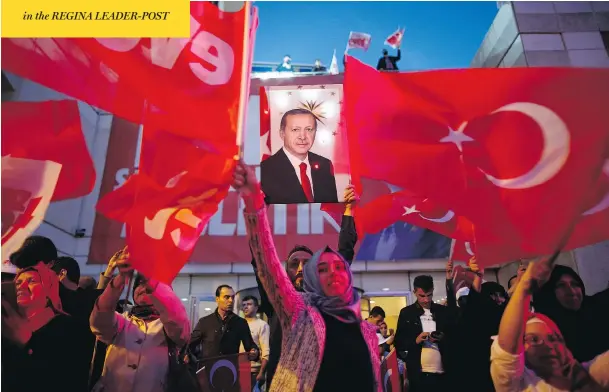  ?? EMRAH GUREL / THE ASSOCIATED PRESS ?? Supporters of Turkish President Recep Tayyip Erdogan celebrate in Istanbul on Sunday after a historic referendum giving him sweeping authority to reform government.