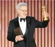  ?? ?? Steven Spielberg accepts the best director award for“The Fabelmans,”which also won best drama film at the Globes.