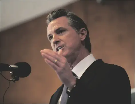 ?? PHOTO ANNE WERNIKOFF, CALMAT
TERS ?? Gov. Gavin Newsom cites California’s strong economy and low infection rates of COVID-19 at IBEW Local 6 in San Francisco on Sept. 14, 2021. On Nov 10, he extended an emergency order.